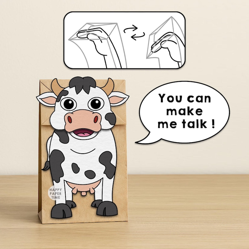 May include: A brown paper bag featuring a cartoon cow illustration with black spots, horns, and a pink muzzle. A speech bubble says "You can make me talk !" and a diagram above shows how to fold the bag to create a mouth movement for the cow.