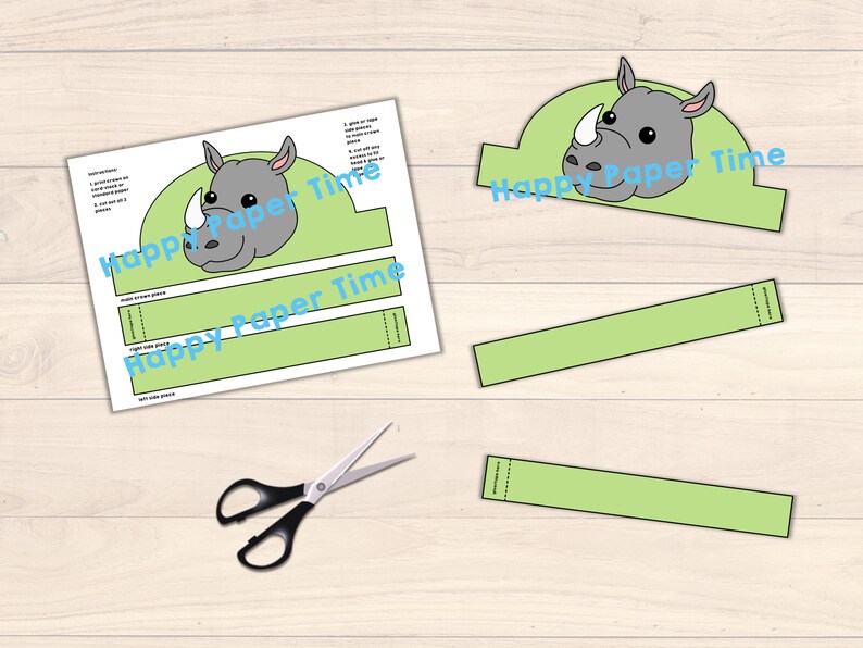 May include: Printable rhino head craft for kids. The craft includes a rhino head with a green headband and instructions for assembly. Happy Paper Time is printed on the craft.