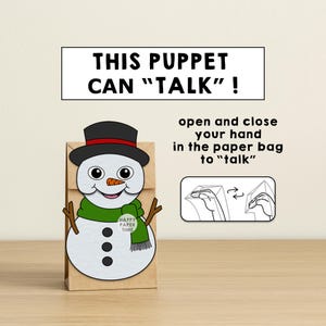 Puede incluir: Una marioneta de bolsa de papel con un dise&ntilde;o de mu&ntilde;eco de nieve. El mu&ntilde;eco de nieve tiene un sombrero negro, una nariz naranja y una bufanda verde. El texto "THIS PUPPET CAN 'TALK'!" est&aacute; en la parte superior. Se incluyen instrucciones.