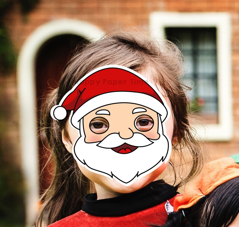 May include: A Santa Claus face mask with a red hat, white beard, and rosy cheeks is placed over a person's face. The mask is a festive holiday decoration. The text "Happy Paper Time" is printed on the mask.