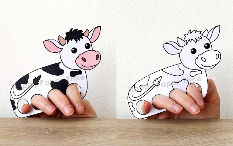 Peut inclure: Un mod&egrave;le de marionnette &agrave; doigts imprimable repr&eacute;sentant une vache noire et blanche avec des taches noires. La vache a un nez rose et des yeux noirs. La marionnette est con&ccedil;ue pour s'adapter aux doigts.