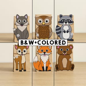 Könnte beinhalten: Sechs braune Papiertüten mit Tier-Ausschnitten von einem Wolf, einer Eule, einem Waschbären, einem Reh, einem Fuchs und einem Bären. Jedes Tier hat große Augen und einen freundlichen Ausdruck. Der Text B&W+COLORED ist mittig über das Bild gelegt.