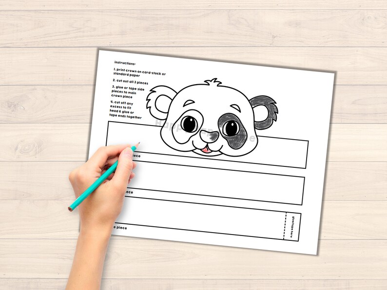 May include: Printable panda mask craft for kids. The mask is black and white and has a cute, cartoon-like face. Instructions are included on the page.