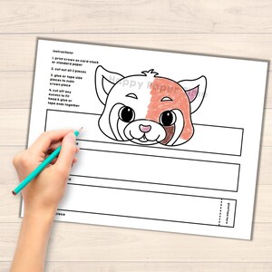 May include: Printable red panda mask craft for kids. The mask is black and white line art with a red and white color section for the face. Instructions are included on the page.