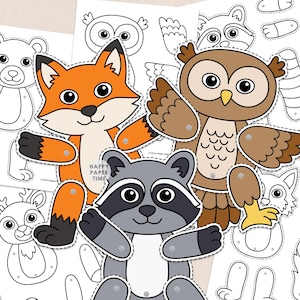 May include: A set of paper craft animal figures including an orange fox, a brown owl, and a gray raccoon with articulated limbs attached by metal fasteners. The figures are layered over black and white outline templates with the text Happy Paper Time.