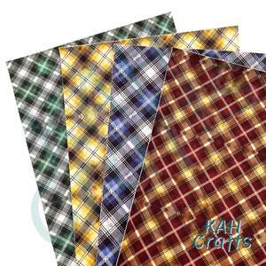 Puede incluir: Cuatro hojas de vinilo con estampado de cuadros en verde, amarillo, azul y rojo sobre fondo blanco. El vinilo está doblado en una pila. La hoja inferior tiene el texto "KAH Crafts" impreso en ella.