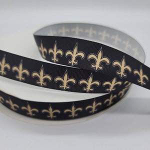 Ruban gros grain fleur de lys noir et doré 7/8" 5 mètres