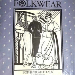 May include: A Folkwear sewing pattern envelope titled Sophisticated Lady, Suit to Sew & Shell to Knit. The cover features a black and white illustration of three figures in vintage-style clothing and two poodles, set against a light blue background.