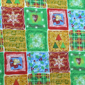 May include: A festive fabric featuring a grid of colorful squares with Christmas motifs including white snowflakes, red hearts, green trees, gold bells, holly leaves, and musical notes. The text Merry Christmas and seasons greetings is printed in white.