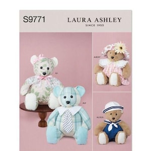 May include: A Simplicity sewing pattern envelope S9771 for Laura Ashley teddy bears. The cover displays three stuffed bears in different outfits: one with a green leaf print, one in a blue plaid shirt with a tie, and one in a pink gingham dress.