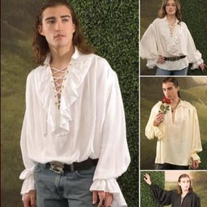 May include: White ruffled poet shirts with lace-up fronts and long sleeves. The shirts are shown in multiple images, with different colors and styles. The shirts are paired with jeans and belts.