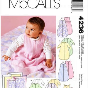May include: McCall's 4236 sewing pattern envelope featuring illustrations of infant sleep sacks and sleepers in various colors and patterns. The front shows a child wearing a pink fleece sleep sack with a star emblem and a front zipper closure.