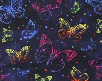 May include: Dark blue fabric with a repeating pattern of colorful butterflies. The butterflies are outlined in neon colors like pink, yellow, orange, and blue. Small, colorful dots are scattered throughout the design.