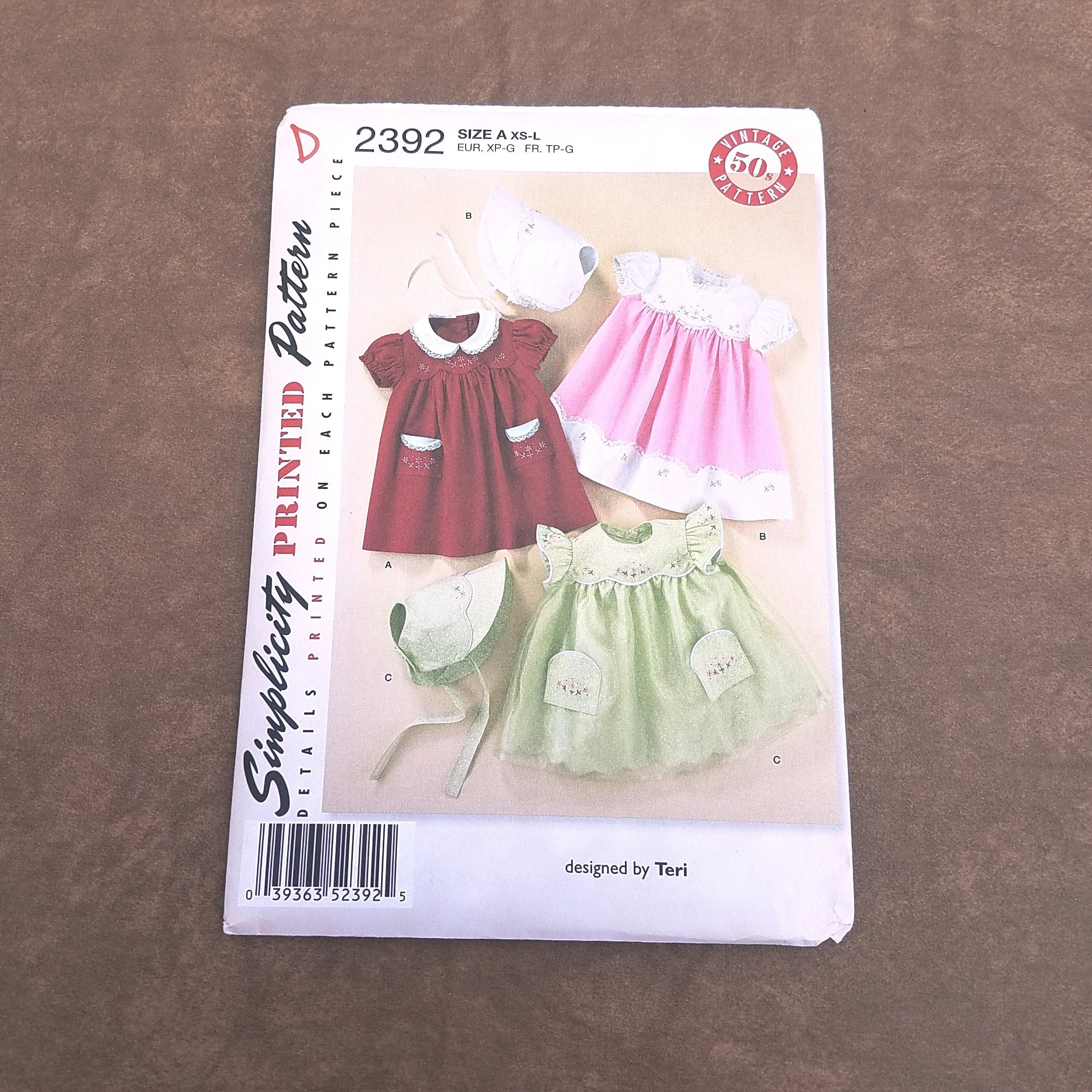 New Uncut Simplicity Pattern 2392 Baby Size XS to L Dress Bonnet With Embroidery 