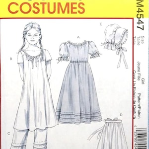 May include: McCall's Costumes pattern for a girl's costume. The package features illustrations of a dress, pants, skirt, and bonnet. The text "McCall's Costumes" is displayed in large, bold letters at the top of the package.