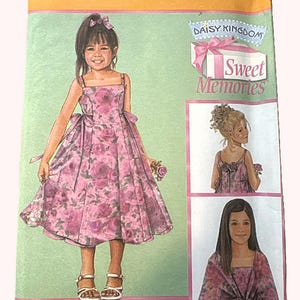 May include: Simplicity sewing pattern 4678, size BB 5, 6, 7, 8, featuring Daisy Kingdom Sweet Memories designs. The envelope displays illustrations of a floral print dress with a square neckline, spaghetti straps, and a matching wrap or bolero.