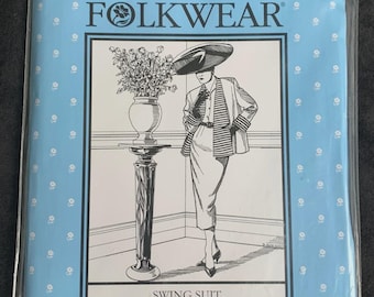 May include: A light blue sewing pattern envelope labelled FOLKWEAR 255 SWING SUIT. The front features a black and white illustration of a person wearing a jacket and skirt, standing next to a pedestal with a vase of flowers, all in a plastic bag.
