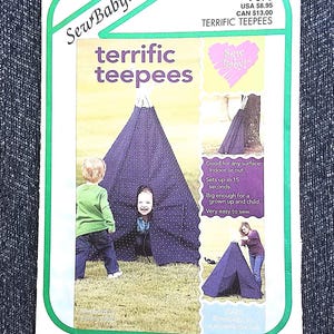 May include: A sewing pattern for "terrific teepees" with a navy blue fabric dotted with white. The pattern cover features children playing in a teepee, with additional images and text. The pattern is designed by Connie Jubitz.