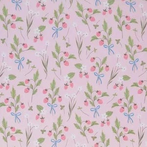 May include: A repeating pattern of strawberry plants with pink berries, green leaves, and light blue bows on a pale pink background. White flowers and small green clovers are also scattered throughout the design.
