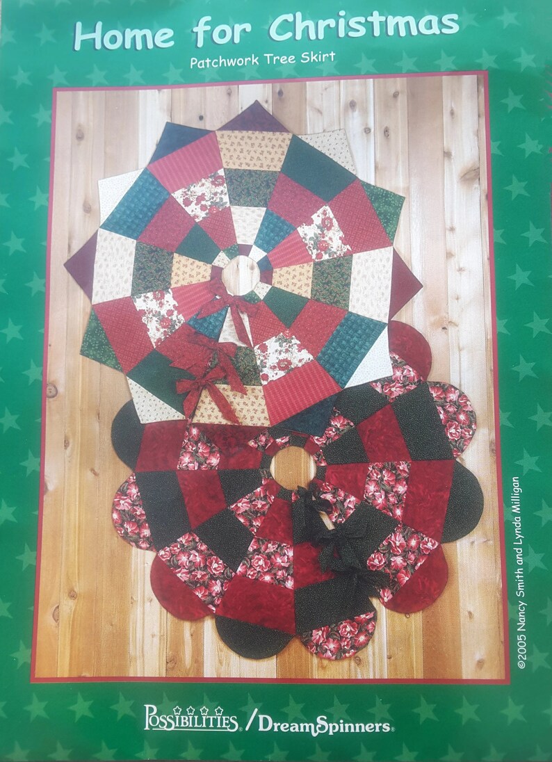 May include: A patchwork Christmas tree skirt with a floral and geometric design. The skirt features red, black, and cream-colored fabrics arranged in a circular pattern. The text "Home for Christmas" is at the top.