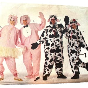 May include: A sewing pattern envelope featuring four costumes: a pink pig jumpsuit with a tutu, a pink pig jumpsuit with a white bib and bowtie, and two black and white cow jumpsuits with hoods, mittens, and tails, labeled A, B, and C.