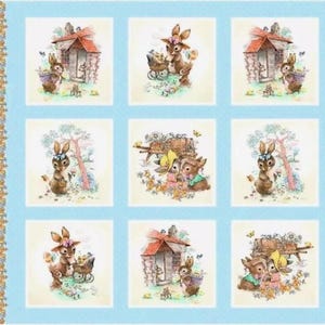 May include: A fabric panel with nine illustrated squares on a light blue background. Each square shows bunnies, a house, and a wheelbarrow. The bunnies wear hats and carry baskets. The border has a floral design.