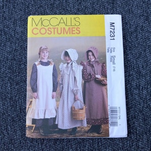May include: A McCall's Costumes sewing pattern envelope, model M7231, size Small (7-8). The cover features three illustrations of children wearing long dresses, bonnets, and aprons in various floral and solid fabrics, with a wooden bucket.