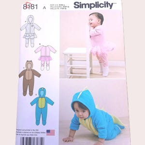 May include: Simplicity pattern 8781 features baby clothing designs. The image shows illustrations of hooded jumpsuits and a baby in a blue dinosaur costume. The pattern includes sizes XXS-L.