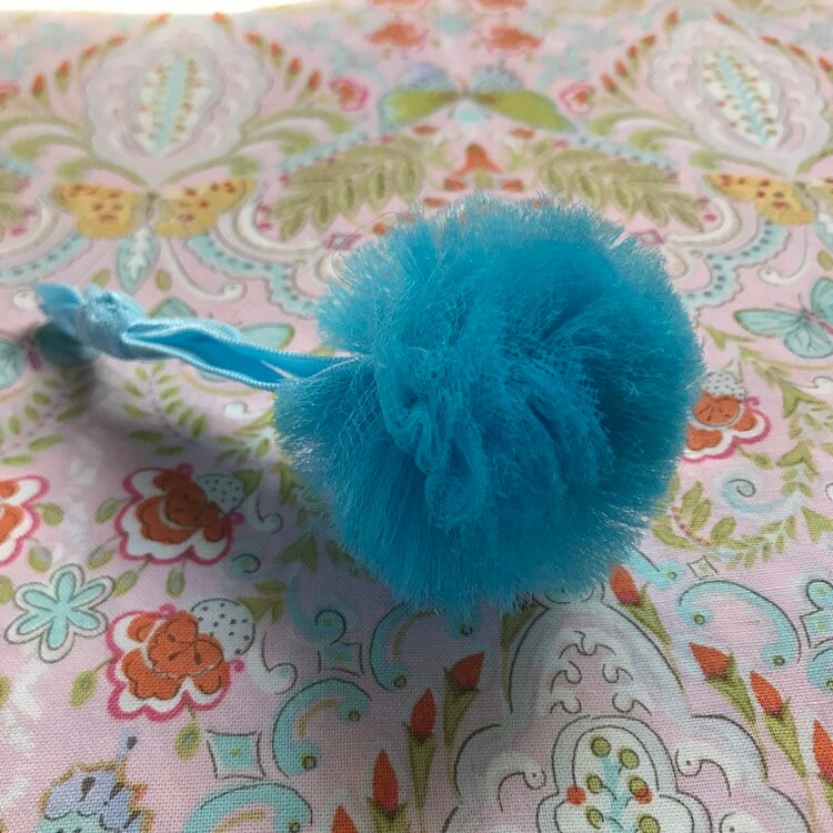 Turquoise blue tulle pom pom hair tie on silky band. Etsy