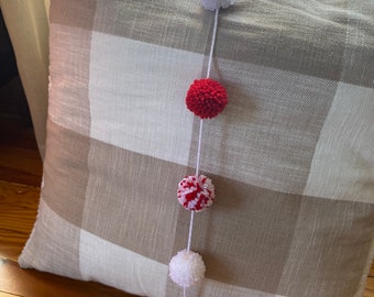 Small and sweet red and white pom pom garland