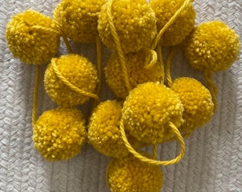 Marigold yellow yarn pom pom garland