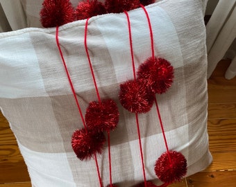 Red sparkling pom pom garland