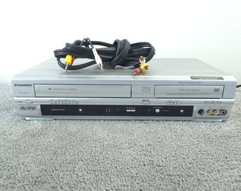 Odtwarzacz DVD/VCR Sylvania SSR90V4 Combo, nagrywarka VHS, zabytkowy, 4-głowicowy, bez pilota, działa