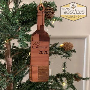 Red Wine Bottle Ornament - laser engraved in cedar wood and personalized with name engraved; unique holiday or Christmas gift!