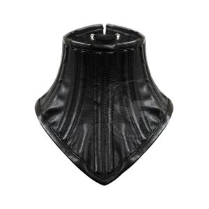 May include: A black leather neck corset featuring vertical stitched panels and a pointed front hem. The collar has a high, structured design with silver-toned metal eyelets at the top center for lacing, creating a fitted, rigid silhouette around the neck.