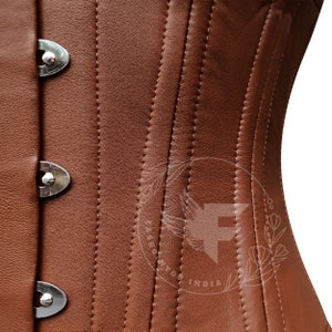 Fashionable women's corset made from brown genuine leather with steel boning