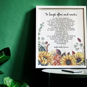 Puede incluir: Una impresi&oacute;n enmarcada en blanco con una cita de Ralph Waldo Emerson sobre el &eacute;xito. La cita est&aacute; rodeada de una ilustraci&oacute;n de acuarela de girasoles y otras flores.