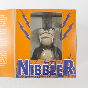 Futurama Nibbler Wind Up Tin Action Toy
