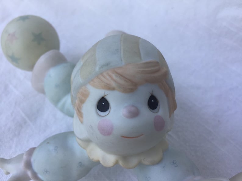 Vintage 1980s Precious Moments Smile Along The Way figurine.