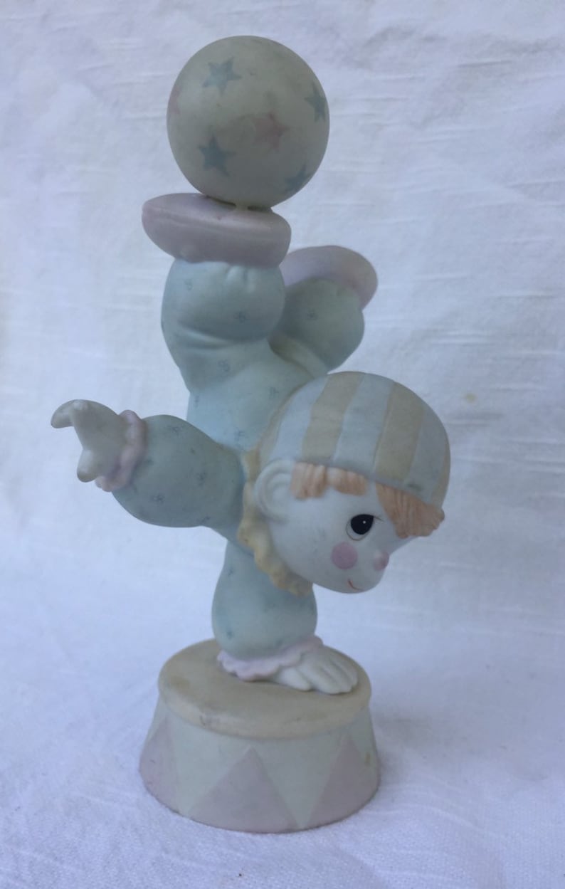 Vintage 1980s Precious Moments Smile Along The Way figurine.