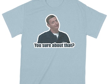 May include: Light blue t-shirt with a picture of a man with a skeptical expression. The text "You sure about that?" is printed on the shirt.