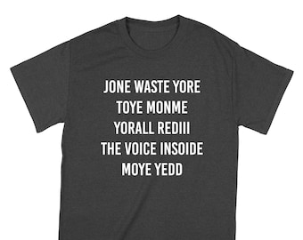 May include: Dark heather grey t-shirt with white text that reads "Jone Waste Yore Toye Monme Yorall Rediii The Voice Insoide Moye Yedd".