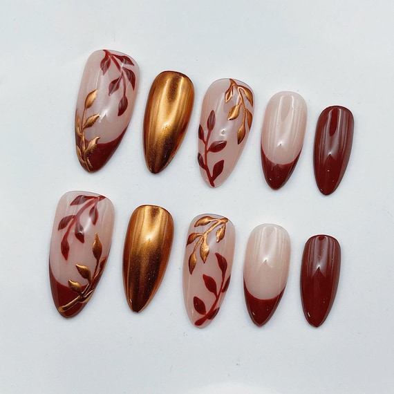 20 Thanksgiving Nail Ideas for a Festive Fall Manicure 9 Red Leaves and Bronze