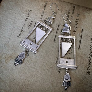 Replica guillotine earrings in silver