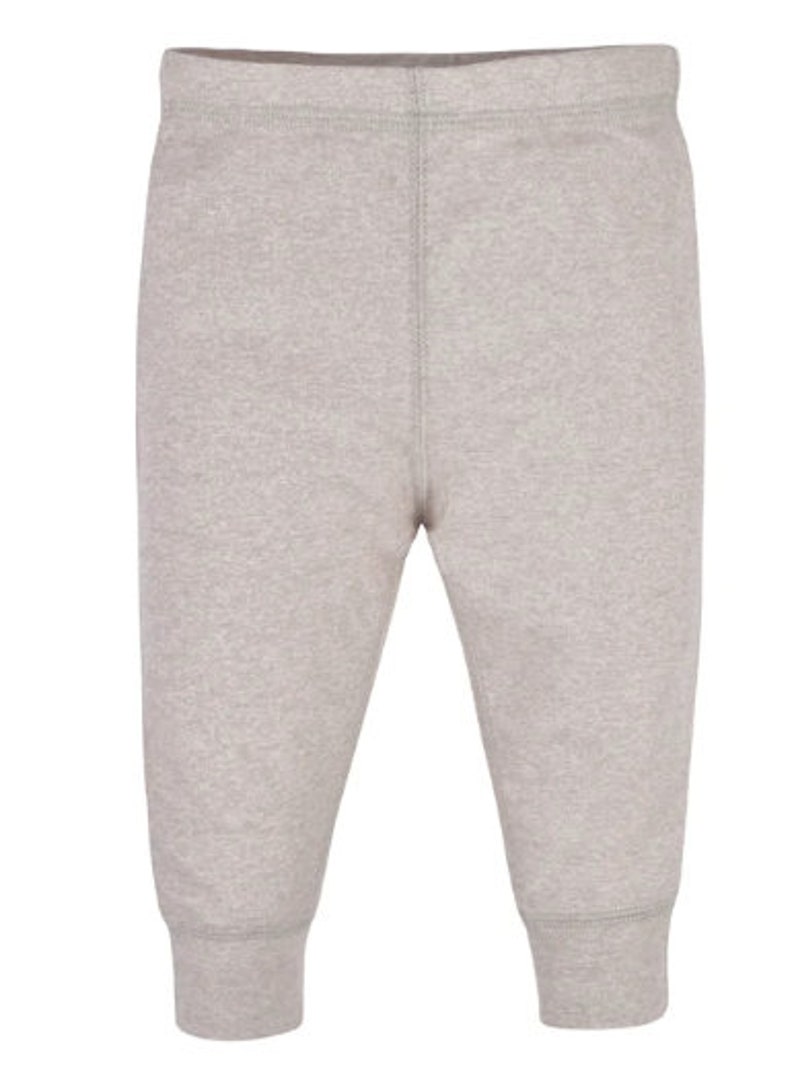 May include: Light grey baby trousers with an elasticated waistband and ribbed cuffs at the ankles. The trousers are made of a soft, knitted fabric and have a vertical seam down the centre of each leg.