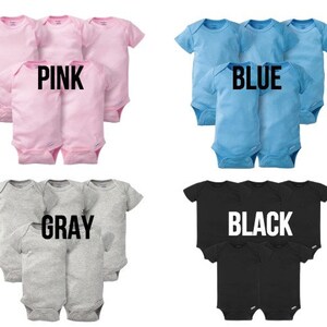 May include: Four sets of baby onesies in pink, blue, grey, and black. Each set includes five onesies. The word "PINK", "BLUE", "GRAY", and "BLACK" are printed in bold white letters on each set of onesies.