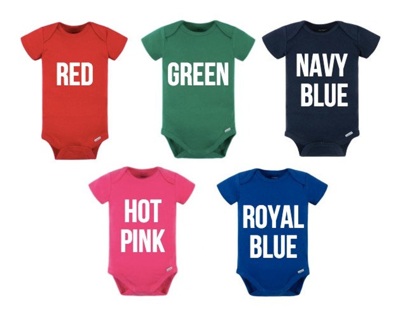 May include: Five baby onesies in red, green, navy blue, hot pink, and royal blue. Each onesie features the colour name printed in large white letters. The onesies are short-sleeved and have a simple, classic design.