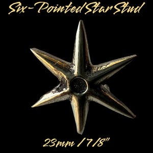 May include: A six-pointed star stud made of metal with a gold finish. The star is 23mm or 7/8 inch in diameter. Six-Pointed Star Stud.