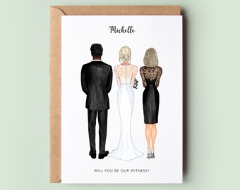 May include: A wedding invitation card with a white background. The card features a cartoon illustration of a bride and groom standing back to back with a bridesmaid standing behind them. The text on the card reads "Michelle, Will you be our witness?"