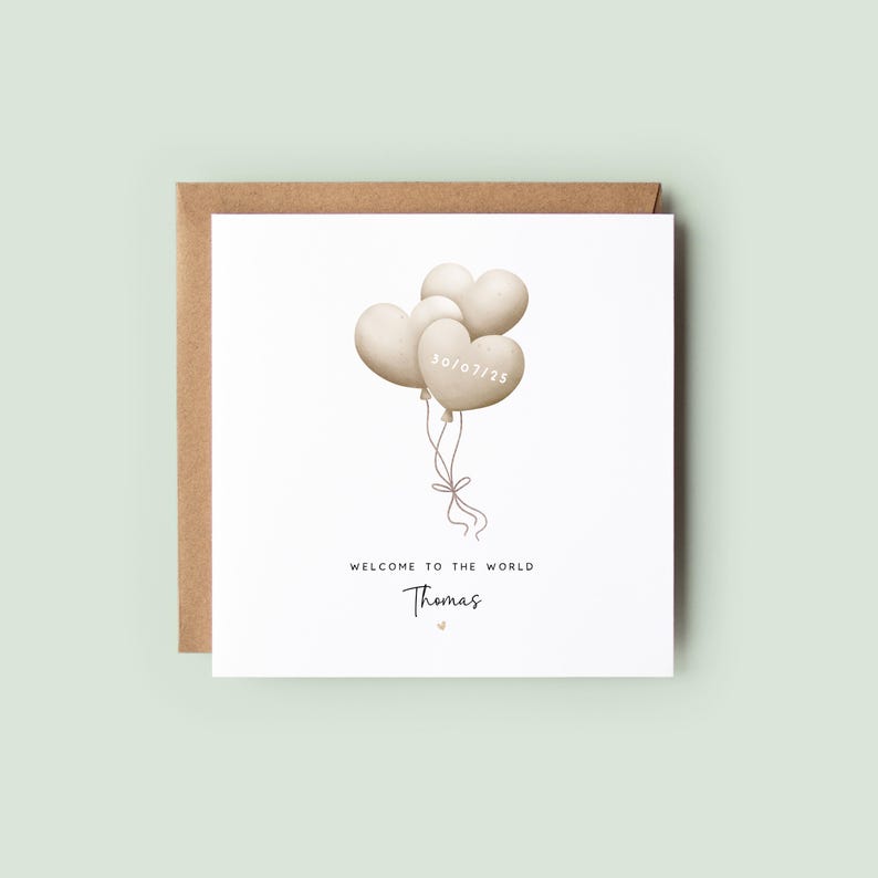 Personalised new baby boy card with blue heart balloons and birth date, featuring the name “Thomas” and soft neutral styling – a keepsake welcome to the world card.